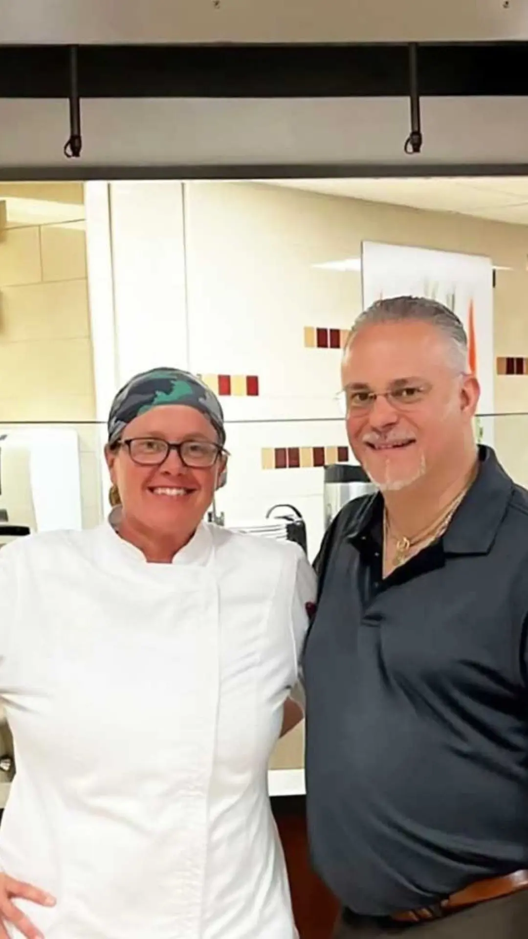Staff smiling in dining hall