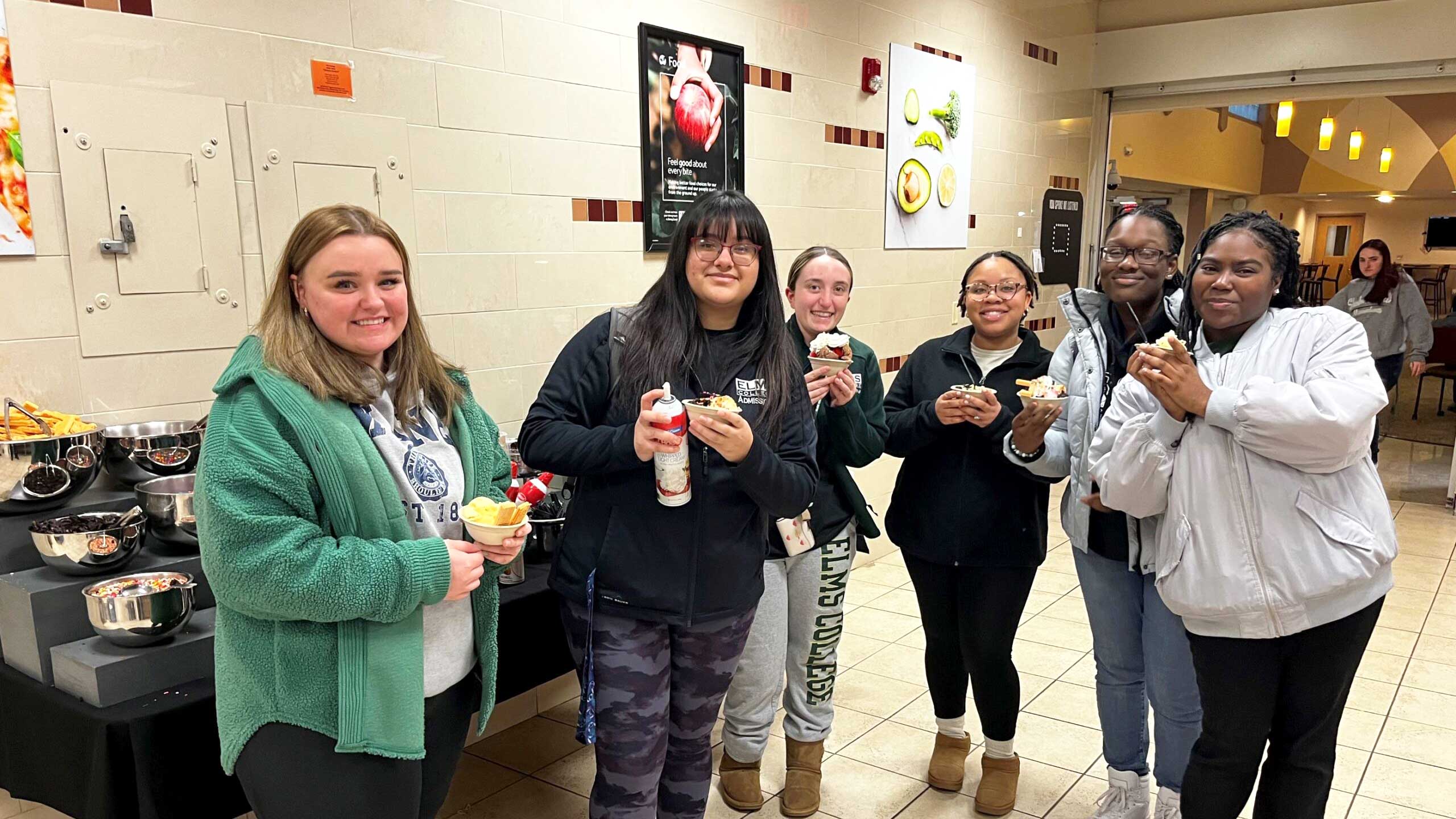 Students at build your own ice cream sundae bar